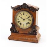 Winterhalder & Hofmeier, walnut mantle clock striking on a gong with painted dial having Roman