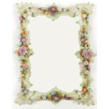 Continental floral encrusted porcelain wall mirror with wood back and bevelled plate, 44cm x 35cm