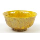 Chinese yellow monochrome porcelain bowl decorated in low relief with dragons amongst clouds, six