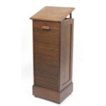 1920's oak filing cabinet with tambour front and easel top, 119.5cm H x 49.5cm W x 43.5cm D