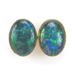 Pair of unmarked gold opal earrings with 18ct gold backs, 8.5mm high, 2.0g