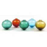 Five globular glass light shades, each 21.5cm high