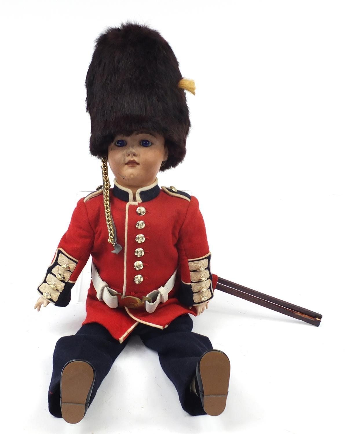 Simon & Halbig bisque headed Beefeater doll, 71cm high