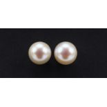 Pair of 18ct gold pearl earrings, 6mm in diameter, 1.6g