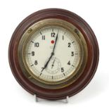 Early 20th century Zenith eight day car clock with mahogany wall mount, retailed by Benzie Cowes,