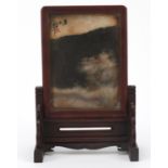 Chinese hardstone table screen with hardwood mount and stand, the panel inscribed with calligraphy