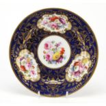 19th century Davenport cabinet plate hand painted and gilded flowers onto a cobalt ground, 22.5cm in