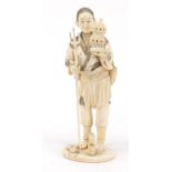 Large Japanese carved ivory okimono of a gentlemen holding a double gourd cricket cage, part paper