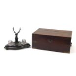 Victorian camping style mahogany writing slope with brass mounts and an ebonised desk stand with