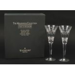 Pair of Waterford Crystal Lismore pattern toasting flutes from the Millennium Collection with box,