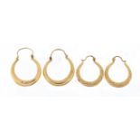 Two pairs of 9ct gold hoop earrings, the largest 2.2cm in diameter, total 2.5g