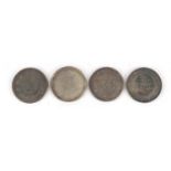 Four Chinese silver coloured metal coins