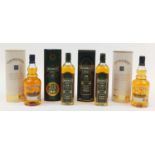 Four bottles of whiskey comprising two bottles of Bushmills Malt aged 10 years and two bottles of