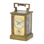 19th century brass cased carriage clock striking on a bell having enamelled and subsidiary dials