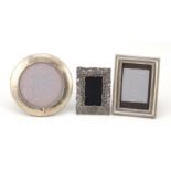 Three silver easel photo frames, the largest 11cm high