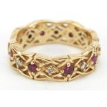 Givenchy, 14ct gold diamond and ruby eternity ring, size M, 4.9g