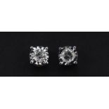 Pair of 9ct white gold diamond solitaire stud earrings with screw backs, approximately 0.25 carat in