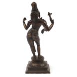 Indian patinated bronze figure of a Deity 40cm high