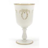 Large Victorian milk glass goblet gilded with bows and swags, 25cm high