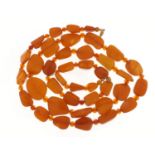 Butterscotch amber coloured bead necklace, 100cm in length, 71.2g