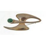 Modernist sterling silver brooch set with a cabochon malachite, 7.5cm in length, 25.5g