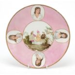 Wedgwood cabinet plate hand painted with panel of figures onto a pink ground, 24.5cm in diameter
