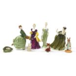 Collectable figures and animals including four Royal Doulton figurines and a Beswick fox, 21.5cm