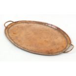 John Pearson, Arts & Crafts oval copper tray with twin handles, impressed marks to the reverse, 56.