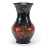 Large William Moorcroft pottery vase hand painted in the pomegranate pattern, painted and