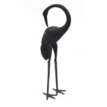 Floor standing patinated bronze stork, 83.5cm high