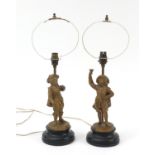Pair of gilt metal Cavalier design table lamps, each 35cm high excluding the fittings