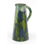 Lakes Cornish pottery jug having a blue and green dripping glaze, 19.5cm high