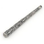 Burmese silver coloured metal walking stick handle embossed with deities, 23cm in length, 109.0g