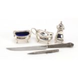 Silver and silver plate including a three piece cruet set retailed by Garrard & Co Ltd and a