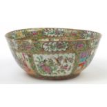 Large Chinese Canton porcelain punch bowl hand painted in the famille rose palette with panels of