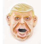 Hand painted cast metal bottle opener caricature of Donald Trump, 10.5cm high