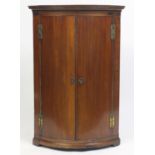 Antique mahogany bow fronted wall hanging corner cupboard, 105cm H x 70cm W x 48cm D