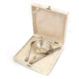 Continental 800 grade silver twin handled dish with knife and fork, housed in a fitted case, the