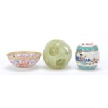 Chinese carved green hardstone puzzle ball, porcelain barrel and eggshell bowl, the largest 9cm in