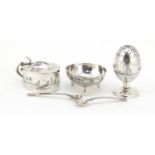 Egyptian silver niello work three piece cruet depicting temples and sailing boats, the largest 7cm