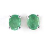 Pair of 9ct white gold emerald stud earrings, 5mm in length, 1.0g
