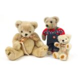 Three Merrythought teddy bears, the largest 46cm high