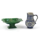 19th century Majolica vine leaf basket and a salt glazed Bellarmine jug, the largest 22cm high