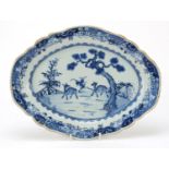 Chinese blue and white porcelain platter hand painted with two deer in a landscape, 37cm wide