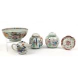 Chinese porcelain including a bowl hand painted with flowers and two ginger jars hand painted in the