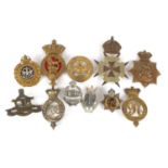 Eleven military interest cap badges including Royal Militia, Royal Army Service Corps, Fear Naught