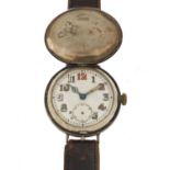 Military interest wristwatch with luminous dial and case by George Stockwell, 34mm in diameter