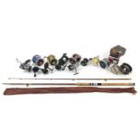 Vintage and later fishing reels and a two piece Woody's of Wembley salmon rod including Penn and