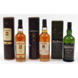 Three bottles of whiskey with boxes comprising two bottles of Aberlour aged 10 years and Ardbeg 10