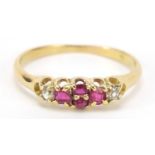18ct gold ruby and diamond ring with pierced shoulders, size N, 1.7g